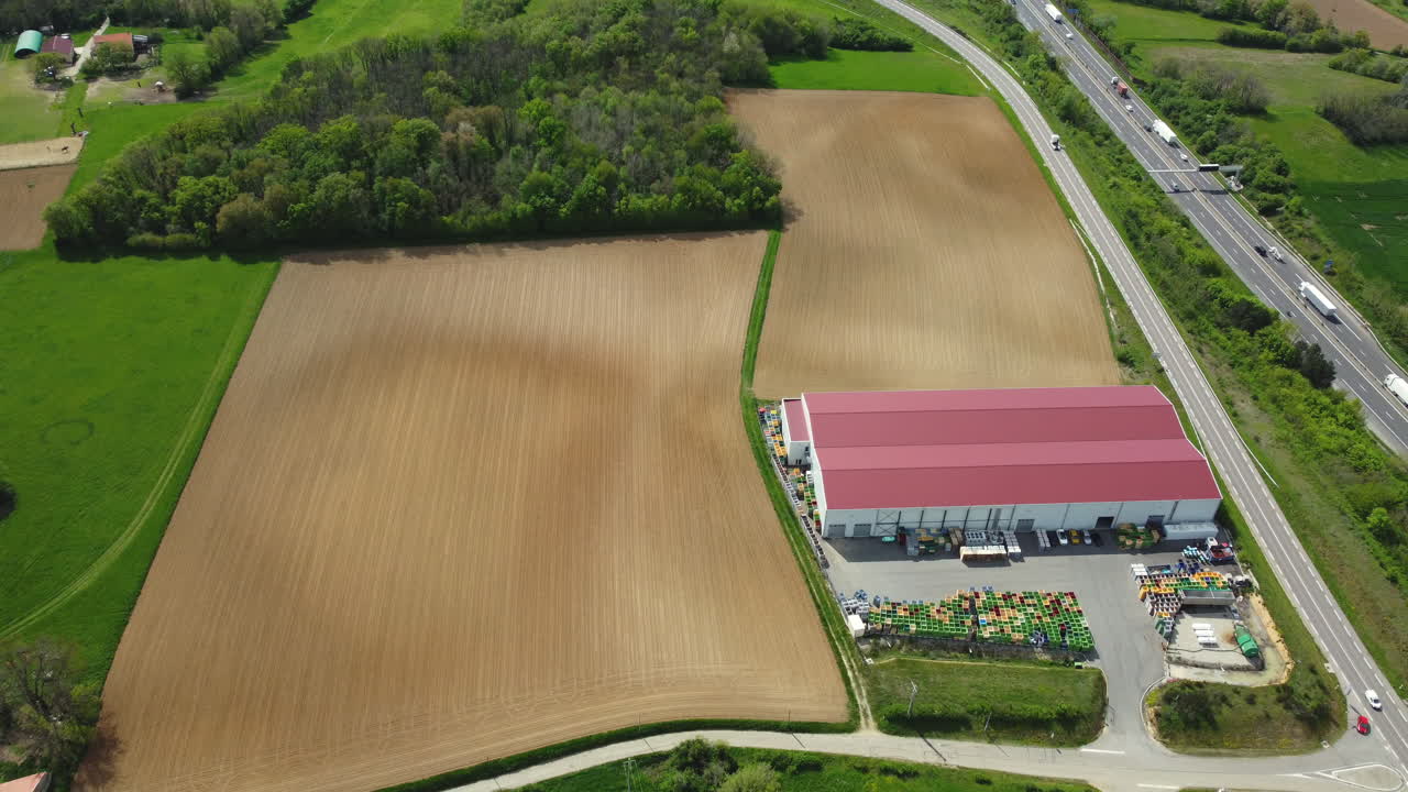Aerial View of Farmland and Warehouse