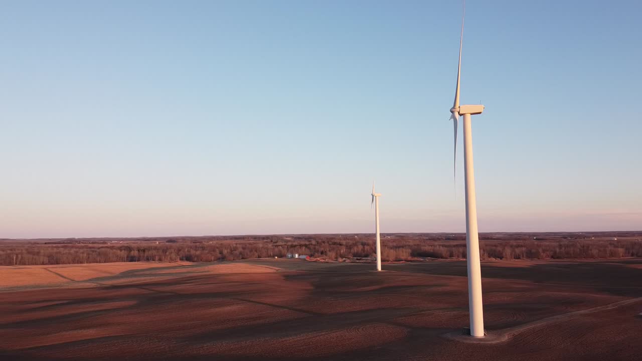 The beautiful white windmills of Ubly, Michigan during sunset - aerial
