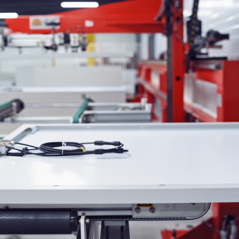 automated industrial equipment at work inside a new plant. interior of a modern factory.