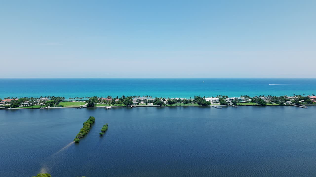 Wide aerial of West Palm Beach coastline and Flagler Beach waterfront buildings
