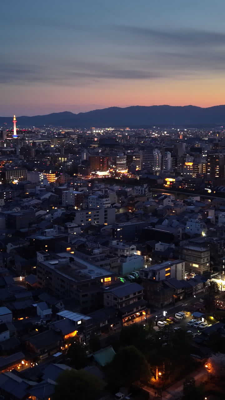 Aerial drone view of the Nidec Kyoto Tower in the evening in Japan