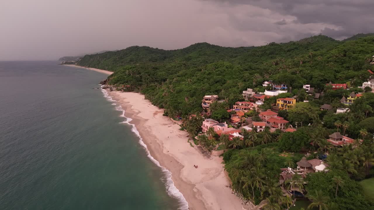 the warm color of this sea flies every one of my senses. The drone sees the golden hour This bay in Sayulita, Mexico that is a place for surfers and surfers makes life more magical.