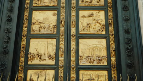 golden doors with scenes from the old testament