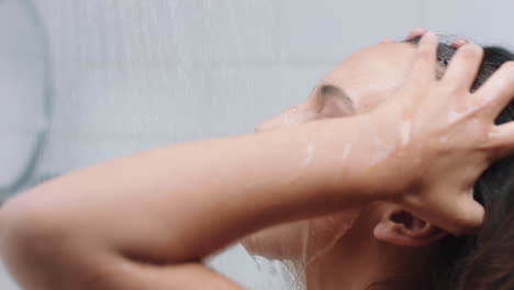 attractive woman taking shower touching wet skin enjoying luxury spa cleansing smooth complexion