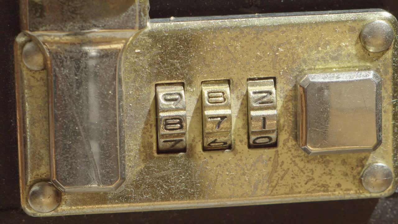 Macro close-up of an old industrial switch panel showing metallic texture, scratches, and buttons. Perfect for cinematic or design use