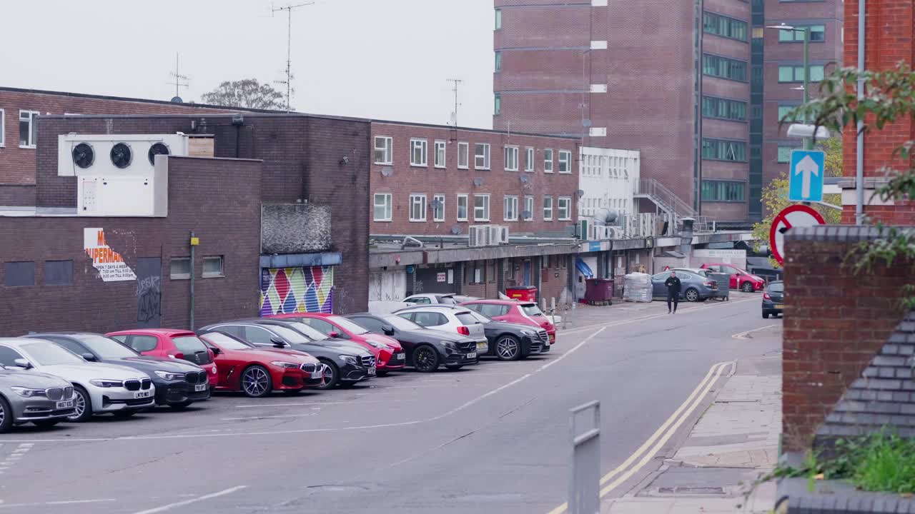 Cars parked on a street in a city