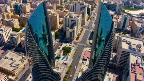 aerial view of modern twin towers in a city