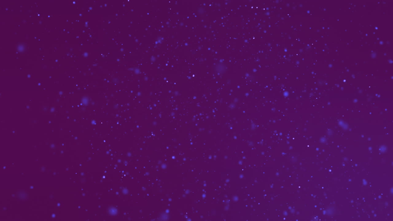 animación de partículas azules y blancas parpadeantes sobre un fondo oscuro