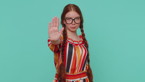 Girl-say-no-hold-palm-folded-crossed-hands-in-stop-gesture,-warning-of-finish,-prohibited-access