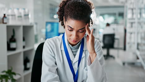 a woman doctor experiencing stress and headache