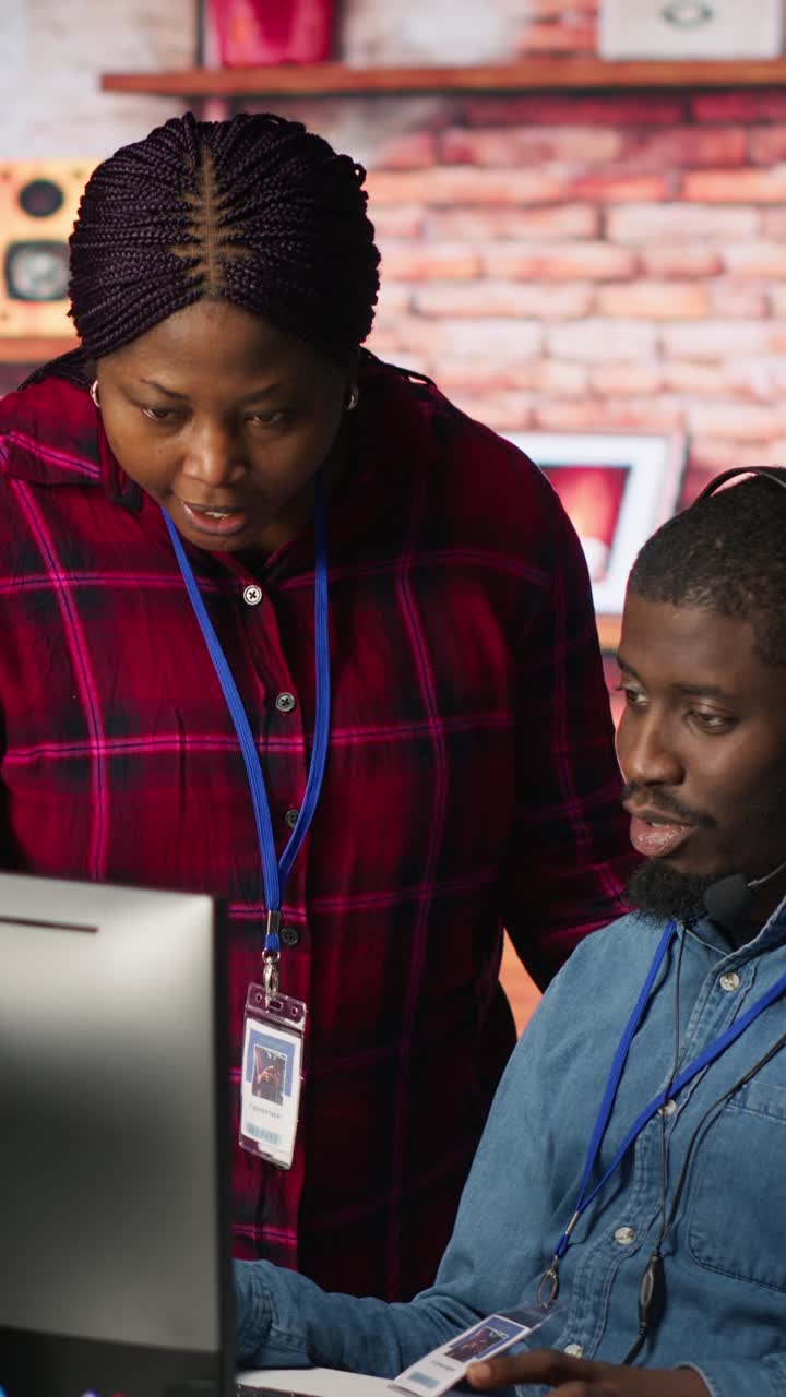 Vertical video Portrait of smiling multiethnic call center agents helping customers