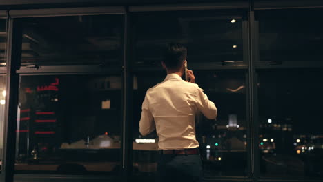 business man, phone call and window at night