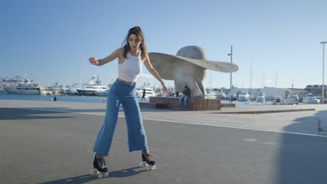 woman roller skating in a city harbor