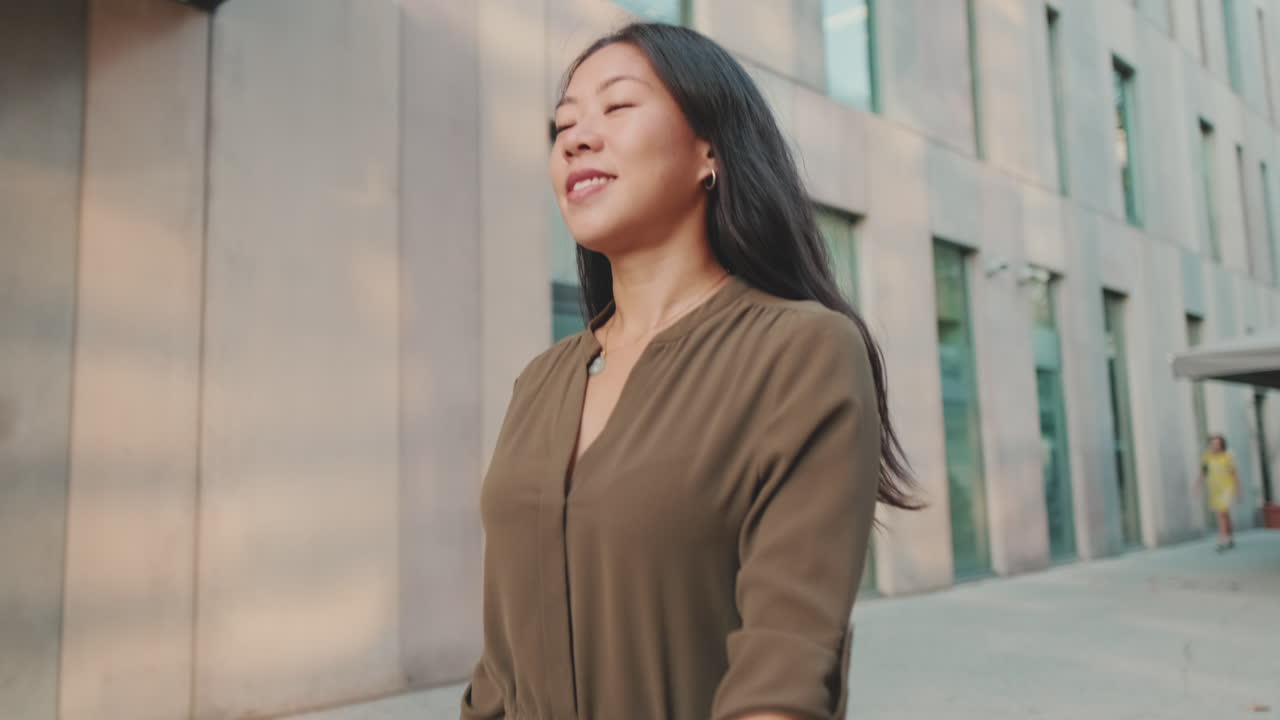 Woman walking in urban setting