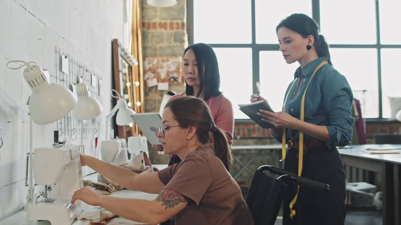 Seamstress Giving Advice to Fashion Designers