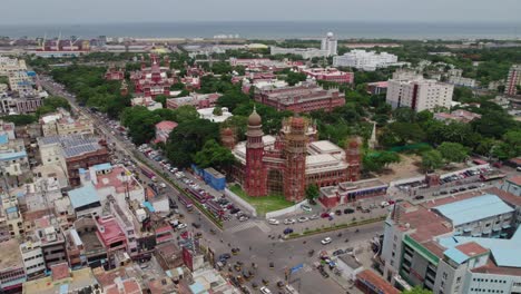 high court of judicature at madras background tamil nadu secretariat with port area and heavy traffic with crowded residentials buildings in chennai, tamil nadu, day time semi orbit drone shot