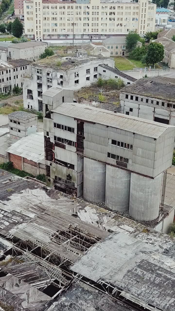 Aerial view of the largest abandoned factory. Factory ruins. Vertical video