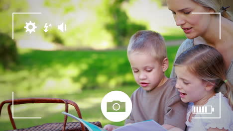 taking photos of a family on a digital camera