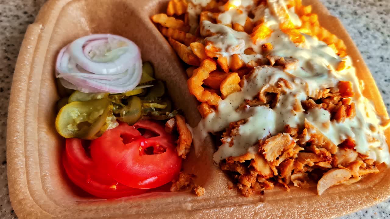 Kebab Plate With Chicken Fries And Fresh Vegetables In Takeout Tray