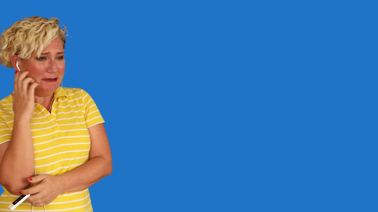 Emotional woman crying at chroma key background 4