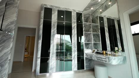 luxury and elegant dressing room decoration idea with marble wall tiles