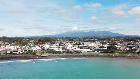 new zealand cityscape of new plymouth, city buildings and coastal walkaway