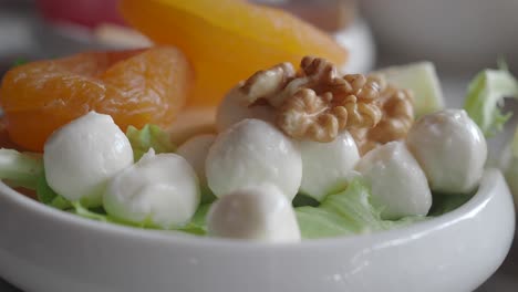 mozzarella balls with dried apricots and walnut