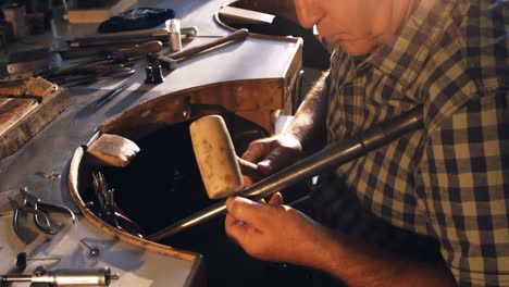 goldsmith preparing work tool