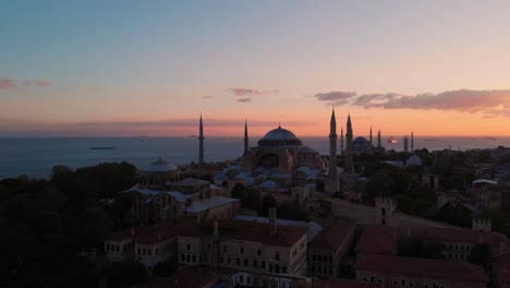 Hagia-Irene,-Hagia-Sophia-Near-Sultan-Ahmed-Mosque-At-Sunset-With-Bosphorus-In-Background-In-Istanbul,-Turkey