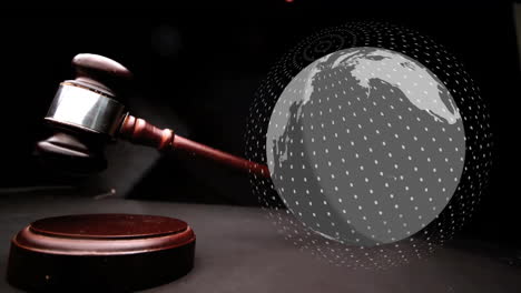 Animation-of-spinning-globe-over-moving-gavel