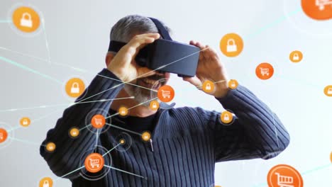 Animation-of-network-of-connections-with-icons-over-man-wearing-vr-headset