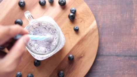 blueberry smoothie in a glass jar