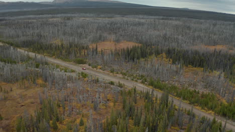 vehicle on gravel road takes the scenic route in british colombia