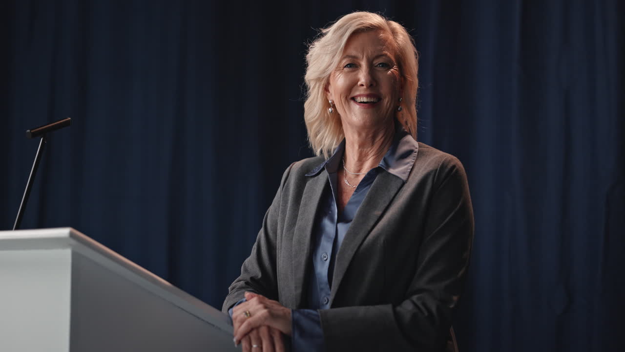 Woman giving a presentation at a podium