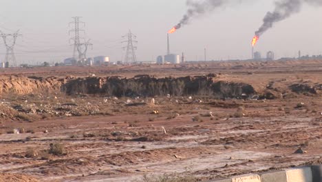 burning extraction wells in an oil or natural gas field in iran  2