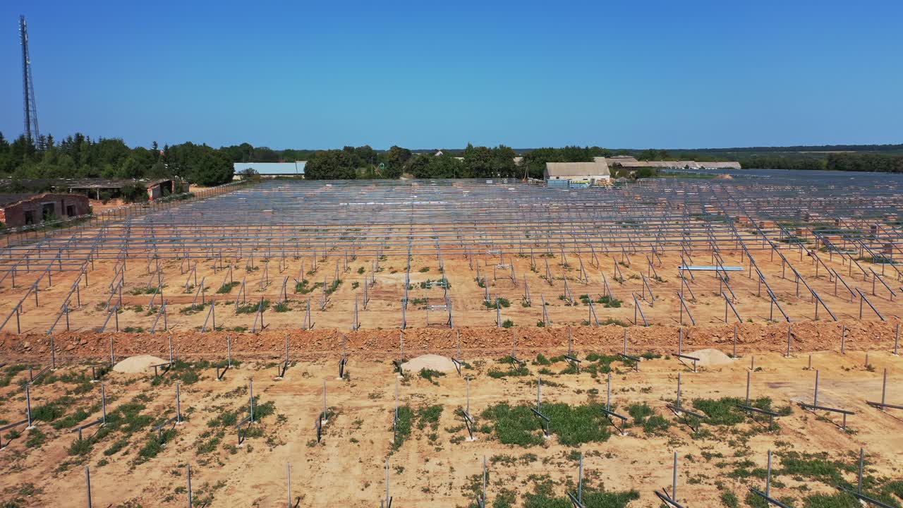 Solar photovoltaic cell panel frame. High angle view of frame for solar panels on energy farm
