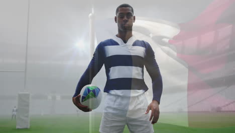holding rugby ball, player on field with flag animation in stadium