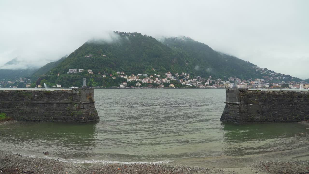 Pier of Lake Como in the Teritory of Luxurious Villa on a Gloomy Day