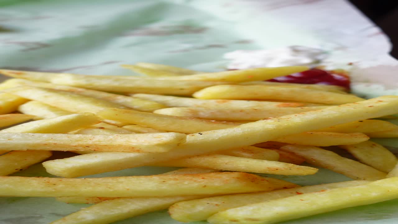 Deliciously seasoned French Fries with Ketchup and Mayo