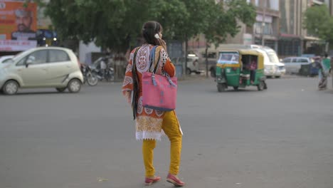 indian woman talking on the phone