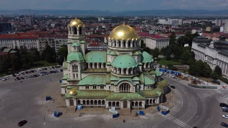aerial 4k drone video of alexander nevsky cathedral with streets of sofia in background - bulgaria