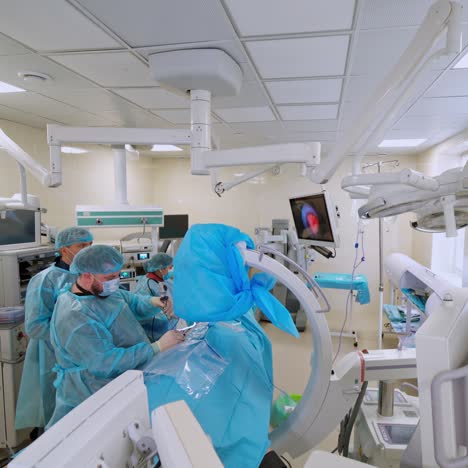 operating room with x-ray medical scan. medical team helping patient. modern equipment in operating room.