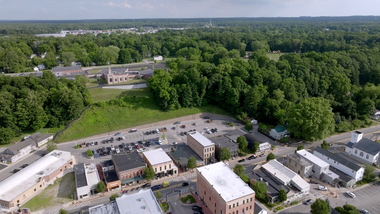 Newaygo, Michigan downtown with drone video moving in at an angle.