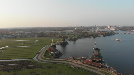 Aerial-view-of-Zaanse-Schans-windmills-unique-part-of-the-Netherlands,-full-of-wooden-houses,-mills,-barns