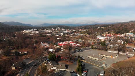 Aerial-flyover-of-mountain-town-located-in-California