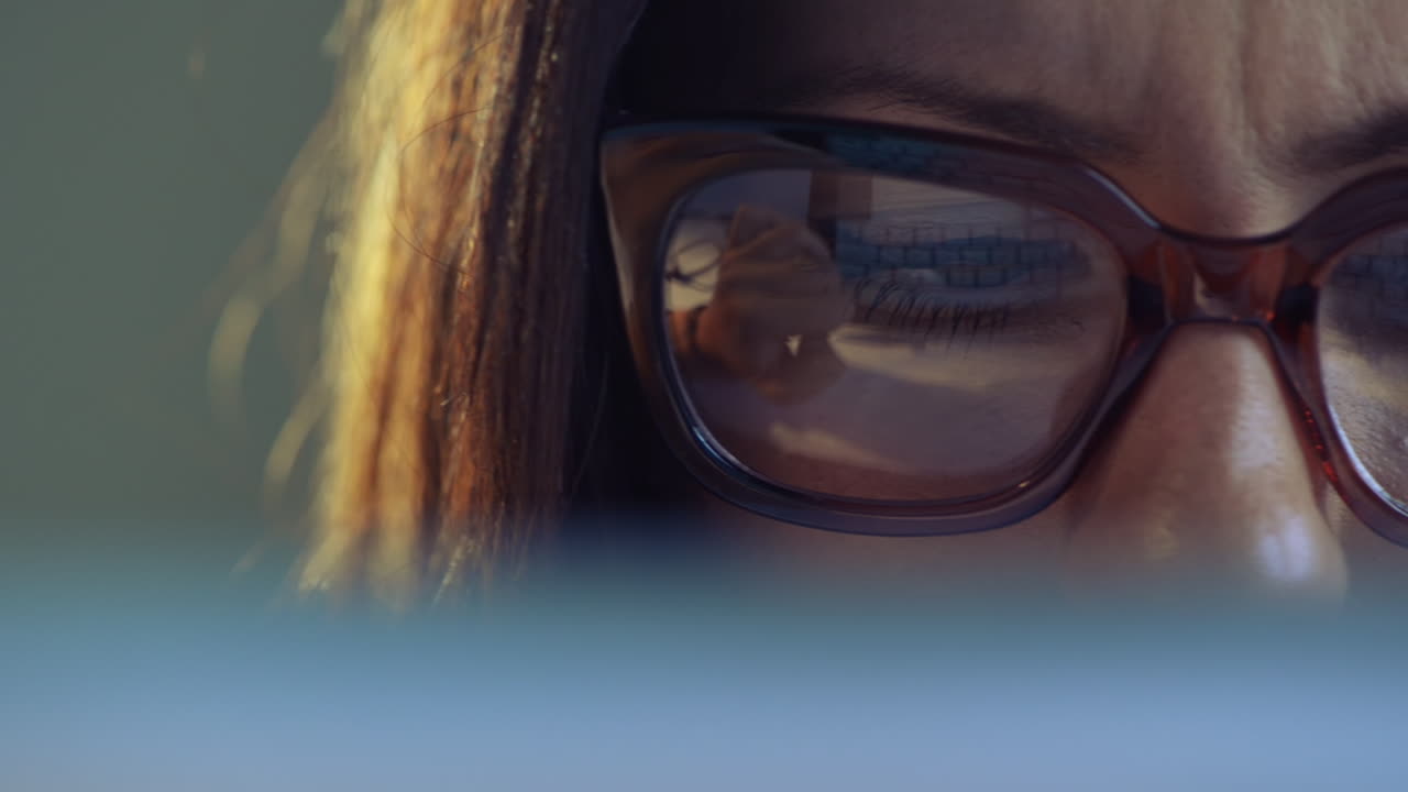 Attractive young woman using digital tablet computer touchscreen ipad