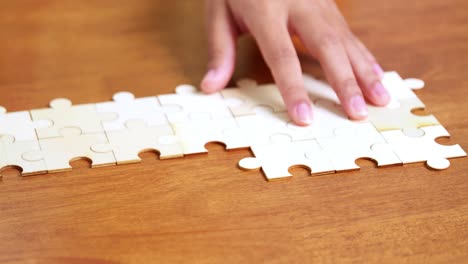 engage the calming process of piecing together a puzzle with focused attention