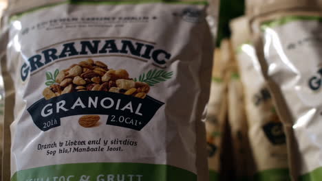 granola bags displayed on shelves in a store