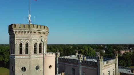 vecauce manor in latvia aerial view of the pink castle through the park