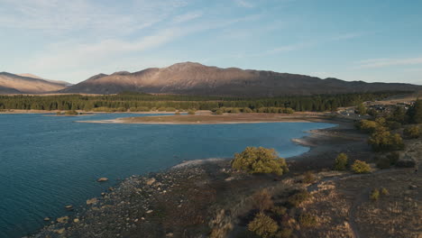 aerial view of lake and mountains in new zealand